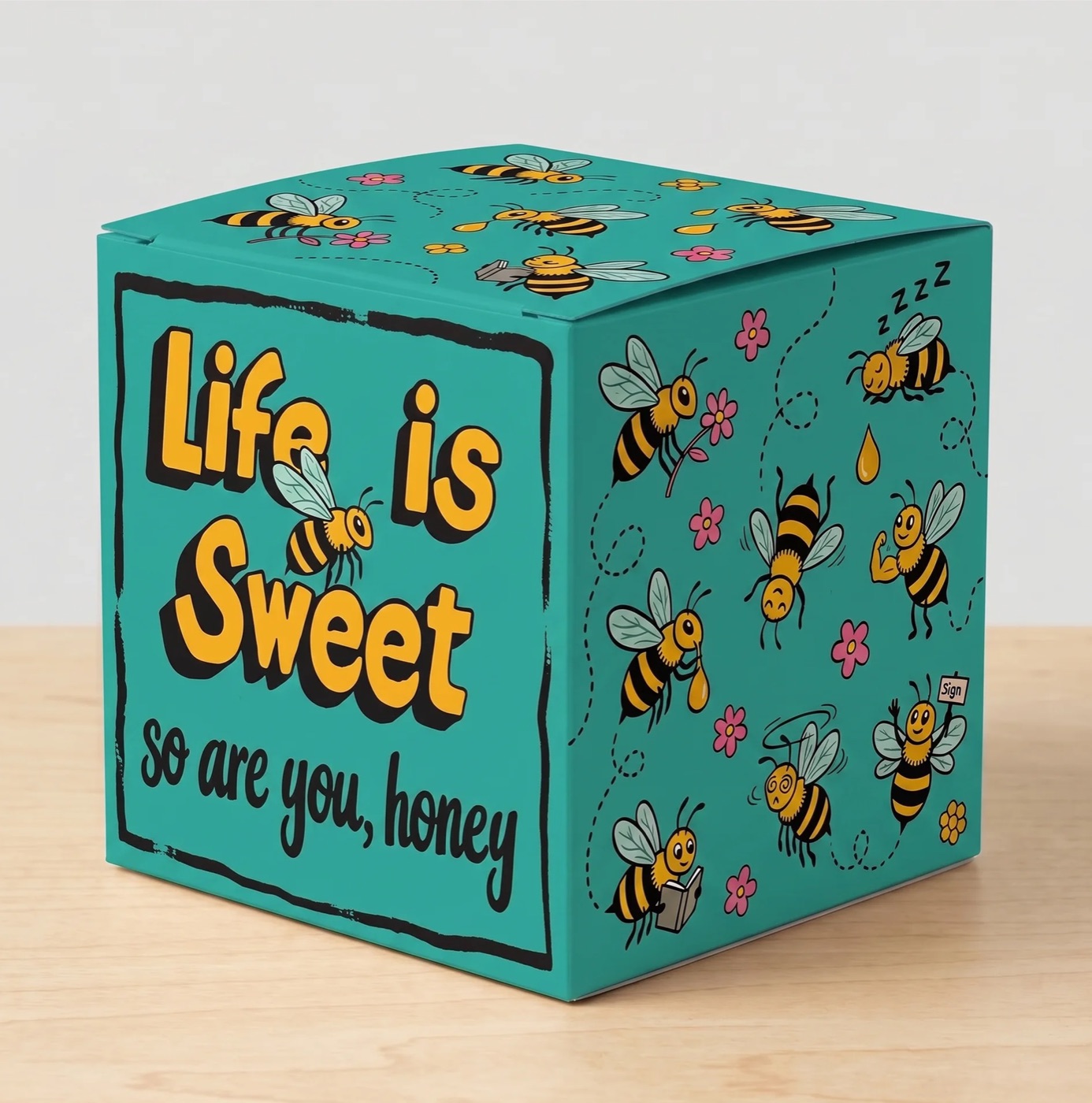 Teal Life is Sweet gift box covered in illustrated bees